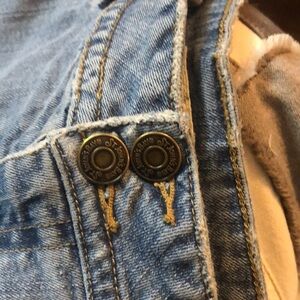 St. John Bay blue Jean skirt, size 10 faded with the stress holes